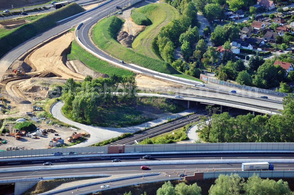 Aerial image Braunschweig - Blick auf den Um- und Ausbau des Autobahndreiecks Braunschweig-Südwest an der Autobahn A29 / A 391 in Niedersachsen. Der EUROVIA Baukonzern errichtet hier einige Brückenneubauten. Bauherr ist die Niedersächsische Landesbehörde für Straßenbau und Verkehr. View of the implementation and expansion of the motorway junction Brunswick-southwest along the freeway A29 / A 395 in Lower Saxony. The construction company EUROVIA built here are some new bridges. Owner is the Lower Saxony state authorities for road construction and transport.