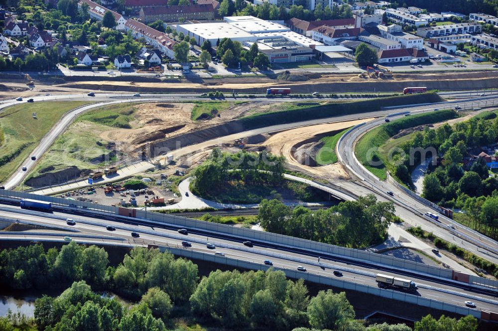 Aerial photograph Braunschweig - Blick auf den Um- und Ausbau des Autobahndreiecks Braunschweig-Südwest an der Autobahn A29 / A 391 in Niedersachsen. Der EUROVIA Baukonzern errichtet hier einige Brückenneubauten. Bauherr ist die Niedersächsische Landesbehörde für Straßenbau und Verkehr. View of the implementation and expansion of the motorway junction Brunswick-southwest along the freeway A29 / A 395 in Lower Saxony. The construction company EUROVIA built here are some new bridges. Owner is the Lower Saxony state authorities for road construction and transport.