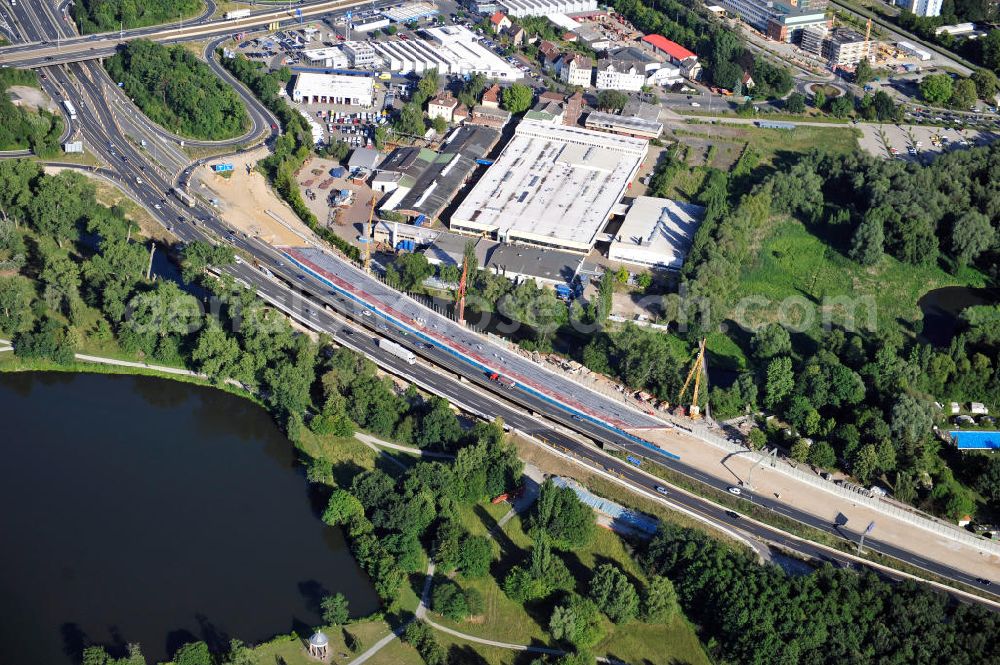 Braunschweig from above - Blick auf den Um- und Ausbau des Autobahndreiecks Braunschweig-Südwest an der Autobahn A29 / A 391 in Niedersachsen. Der EUROVIA Baukonzern errichtet hier einige Brückenneubauten. Bauherr ist die Niedersächsische Landesbehörde für Straßenbau und Verkehr. View of the implementation and expansion of the motorway junction Brunswick-southwest along the freeway A29 / A 395 in Lower Saxony. The construction company EUROVIA built here are some new bridges. Owner is the Lower Saxony state authorities for road construction and transport.