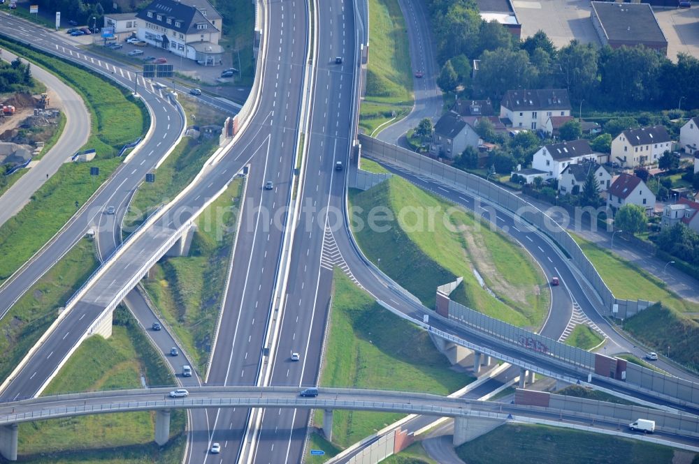 Braunschweig from the bird's eye view: View of the implementation and expansion of the motorway junction Brunswick-southwest along the freeway A29 / A 395 in Lower Saxony. The construction company EUROVIA built here are some new bridges. Owner is the Lower Saxony state authorities for road construction and transport