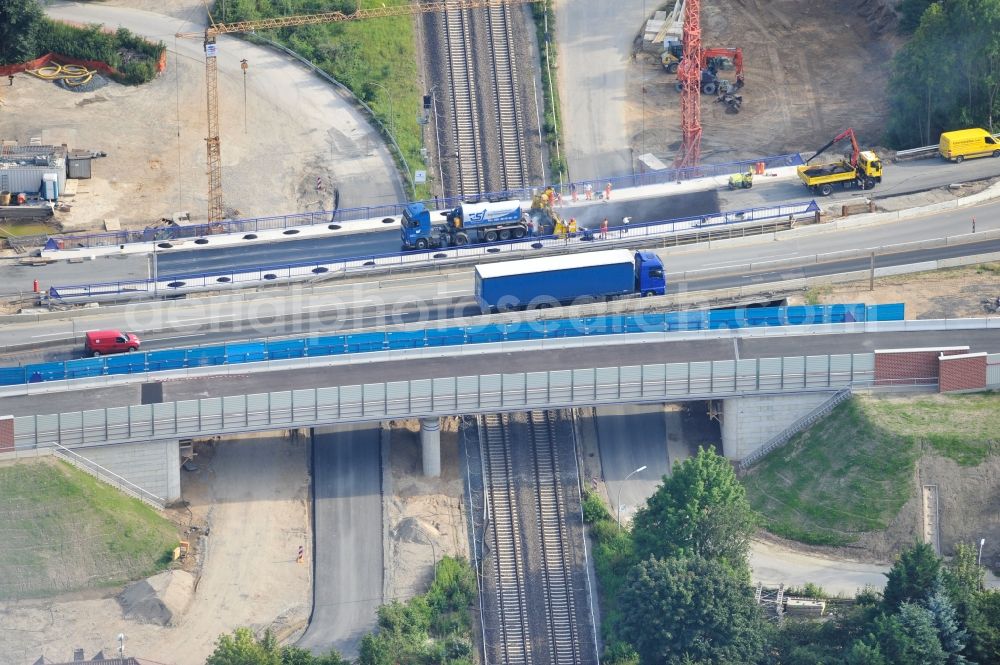 Braunschweig from the bird's eye view: View of the implementation and expansion of the motorway junction Brunswick-southwest along the freeway A29 / A 395 in Lower Saxony. The construction company EUROVIA built here are some new bridges. Owner is the Lower Saxony state authorities for road construction and transport