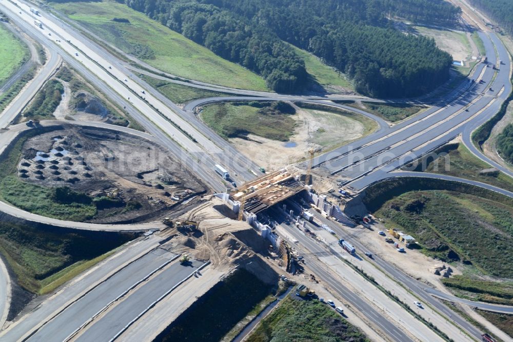 Wöbbelin from the bird's eye view: Expansion and construction site of the highway triangle Schwerin on the motorway BAB A14 and A24 at Wöbbelin in Mecklenburg - Western Pomerania