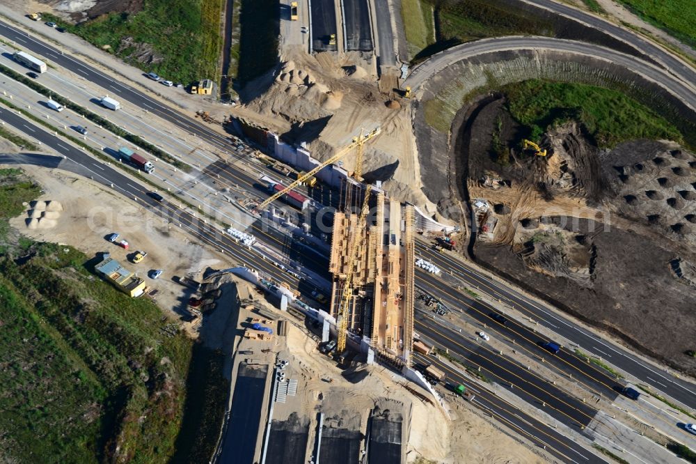 Wöbbelin from the bird's eye view: Expansion and construction site of the highway triangle Schwerin on the motorway BAB A14 and A24 at Wöbbelin in Mecklenburg - Western Pomerania