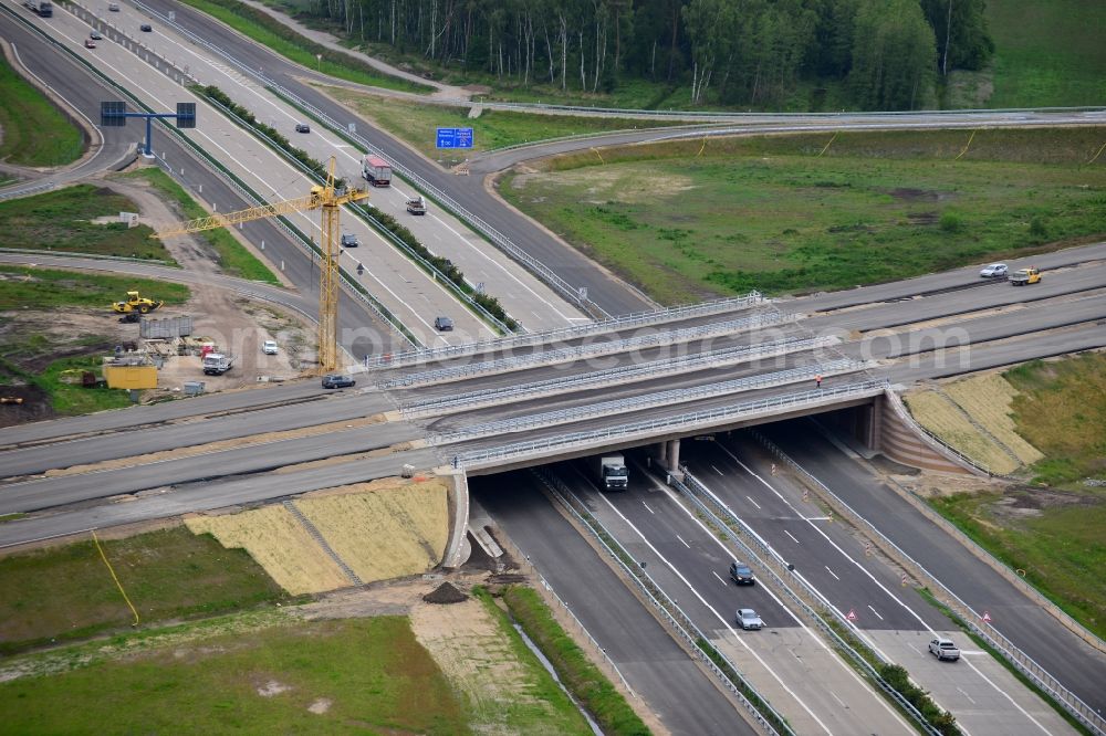 Wöbbelin from the bird's eye view: Expansion and construction site of the highway triangle Schwerin on the motorway BAB A14 and A24 at Woebbelin in Mecklenburg - Western Pomerania