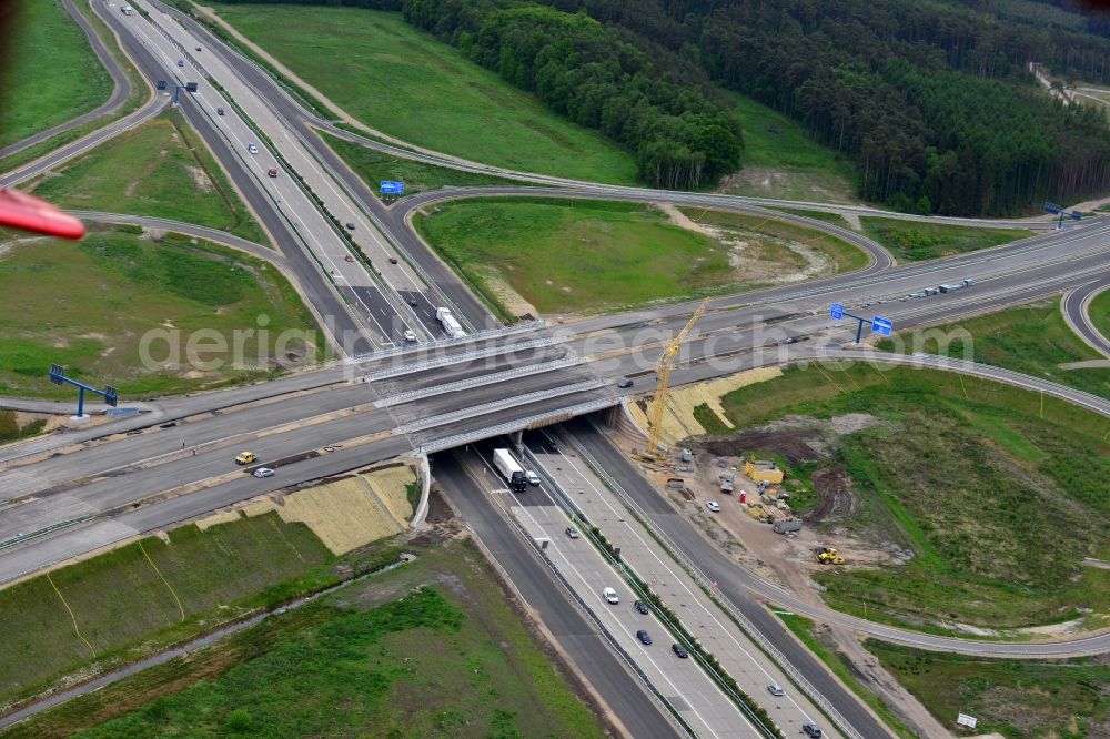 Aerial photograph Wöbbelin - Expansion and construction site of the highway triangle Schwerin on the motorway BAB A14 and A24 at Woebbelin in Mecklenburg - Western Pomerania