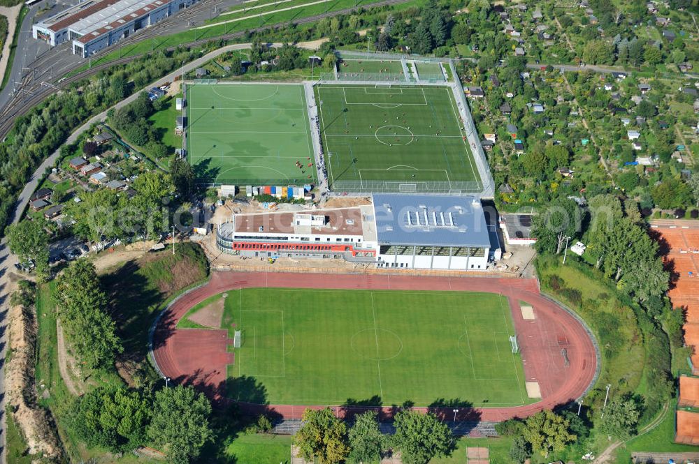 Aerial image Frankfurt am Main - Blick auf den fast fertigen Um- und Erweiterungsbau am Stadion am Riederwald im Stadtteil Seckbach. Der Verein Eintracht Frankfurt e.V. lies durch die Baufirma Anton Schick GmbH und Co. KG.nach Entwürfen des Architekt Peter Fenchel ein Vereinszentrum bauen.