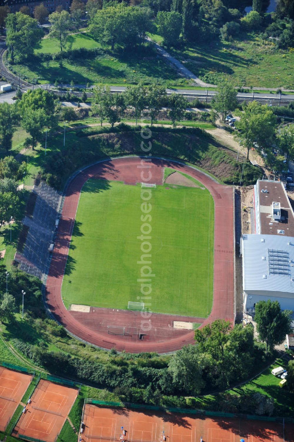 Frankfurt am Main from the bird's eye view: Blick auf den fast fertigen Um- und Erweiterungsbau am Stadion am Riederwald im Stadtteil Seckbach. Der Verein Eintracht Frankfurt e.V. lies durch die Baufirma Anton Schick GmbH und Co. KG.nach Entwürfen des Architekt Peter Fenchel ein Vereinszentrum bauen.