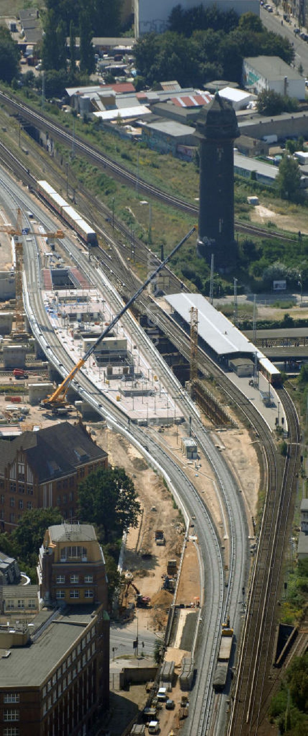 Berlin from above - Blick auf den Um- und Neubau des Berliner S-Bahnhofs Ostkreuz. Der Bahnhof wurde bereits im Jahr 1882 eröffnet und ist somit stark sanierungsbedürftig. Teile der Neubauten führt die EUROVIA Beton GmbH aus. Weiterhin beteiligt ist das Unternehmen VEPRO Verkehrsbauprojekt GmbH. Kontakt EUROVIA: EUROVIA BEton GmbH, Niederlassung Ingenieurbau und Zweigniederlassung Cottbus, Gewerbeparkstraße 17, 03099 Kolkwitz, Tel. +49(0)355 35552 3, Fax +49(0)355 35552 52, EMail: ingenieurbau@eurovia.de; Kontakt VEPRO: Verkehrsbau Projekt GmbH, Storkower Str. 132, 10407 Berlin, Tel. +49(0)30 42194 0, Fax +49(0)30 42194 221