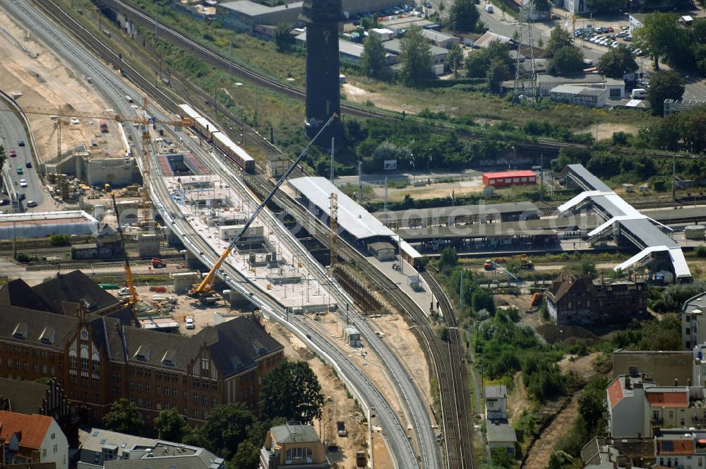 Aerial image Berlin - Blick auf den Um- und Neubau des Berliner S-Bahnhofs Ostkreuz. Der Bahnhof wurde bereits im Jahr 1882 eröffnet und ist somit stark sanierungsbedürftig. Teile der Neubauten führt die EUROVIA Beton GmbH aus. Weiterhin beteiligt ist das Unternehmen VEPRO Verkehrsbauprojekt GmbH. Kontakt EUROVIA: EUROVIA BEton GmbH, Niederlassung Ingenieurbau und Zweigniederlassung Cottbus, Gewerbeparkstraße 17, 03099 Kolkwitz, Tel. +49(0)355 35552 3, Fax +49(0)355 35552 52, EMail: ingenieurbau@eurovia.de; Kontakt VEPRO: Verkehrsbau Projekt GmbH, Storkower Str. 132, 10407 Berlin, Tel. +49(0)30 42194 0, Fax +49(0)30 42194 221