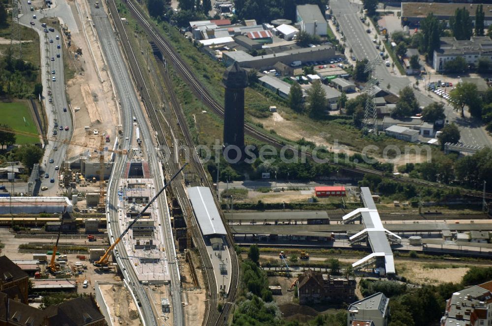 Aerial photograph Berlin - Blick auf den Um- und Neubau des Berliner S-Bahnhofs Ostkreuz. Der Bahnhof wurde bereits im Jahr 1882 eröffnet und ist somit stark sanierungsbedürftig. Teile der Neubauten führt die EUROVIA Beton GmbH aus. Weiterhin beteiligt ist das Unternehmen VEPRO Verkehrsbauprojekt GmbH. Kontakt EUROVIA: EUROVIA BEton GmbH, Niederlassung Ingenieurbau und Zweigniederlassung Cottbus, Gewerbeparkstraße 17, 03099 Kolkwitz, Tel. +49(0)355 35552 3, Fax +49(0)355 35552 52, EMail: ingenieurbau@eurovia.de; Kontakt VEPRO: Verkehrsbau Projekt GmbH, Storkower Str. 132, 10407 Berlin, Tel. +49(0)30 42194 0, Fax +49(0)30 42194 221