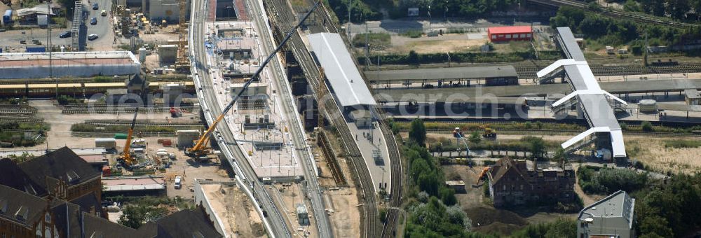 Berlin from the bird's eye view: Blick auf den Um- und Neubau des Berliner S-Bahnhofs Ostkreuz. Der Bahnhof wurde bereits im Jahr 1882 eröffnet und ist somit stark sanierungsbedürftig. Teile der Neubauten führt die EUROVIA Beton GmbH aus. Weiterhin beteiligt ist das Unternehmen VEPRO Verkehrsbauprojekt GmbH. Kontakt EUROVIA: EUROVIA BEton GmbH, Niederlassung Ingenieurbau und Zweigniederlassung Cottbus, Gewerbeparkstraße 17, 03099 Kolkwitz, Tel. +49(0)355 35552 3, Fax +49(0)355 35552 52, EMail: ingenieurbau@eurovia.de; Kontakt VEPRO: Verkehrsbau Projekt GmbH, Storkower Str. 132, 10407 Berlin, Tel. +49(0)30 42194 0, Fax +49(0)30 42194 221