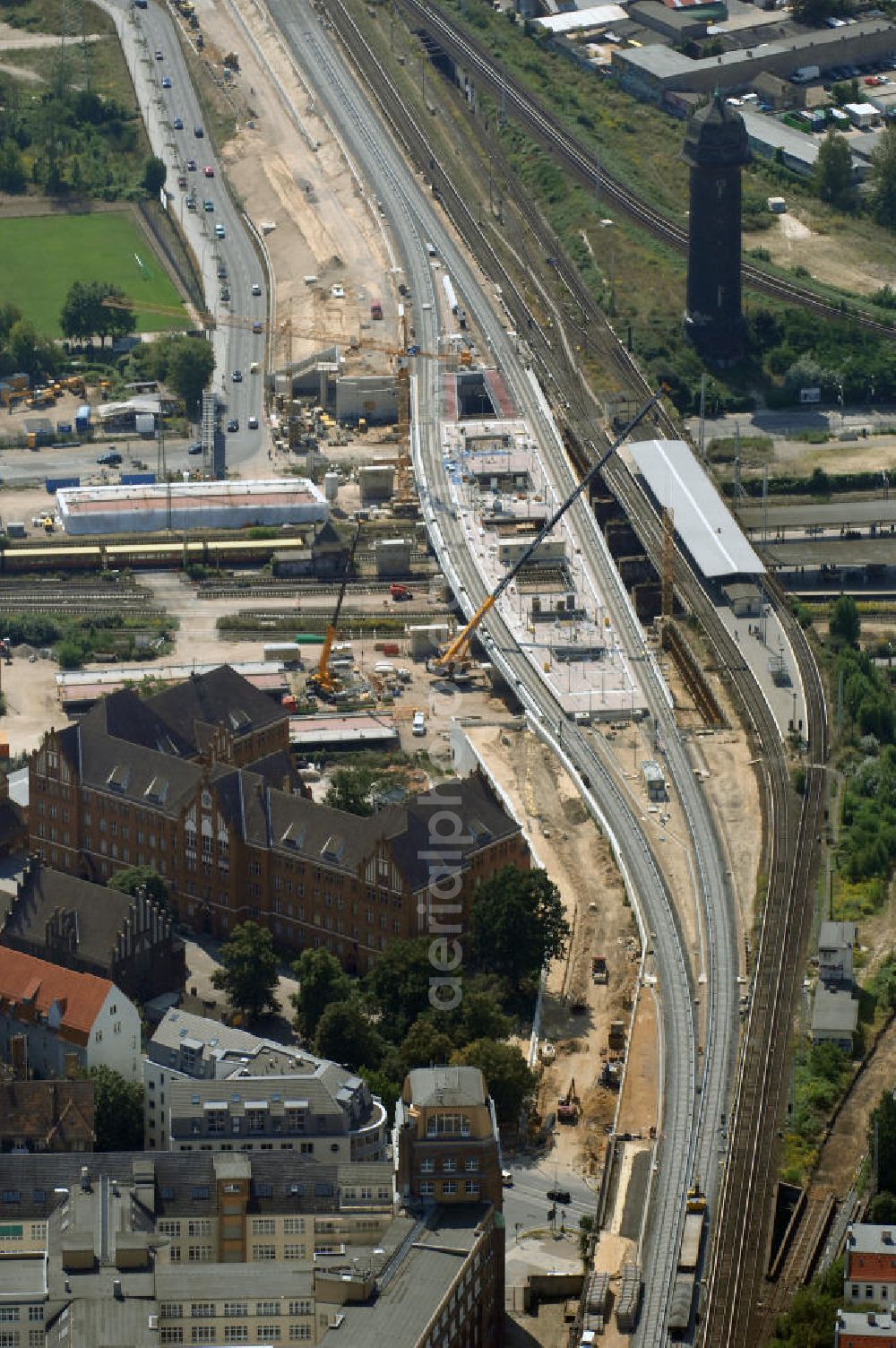 Aerial image Berlin - Blick auf den Um- und Neubau des Berliner S-Bahnhofs Ostkreuz. Der Bahnhof wurde bereits im Jahr 1882 eröffnet und ist somit stark sanierungsbedürftig. Teile der Neubauten führt die EUROVIA Beton GmbH aus. Weiterhin beteiligt ist das Unternehmen VEPRO Verkehrsbauprojekt GmbH. Kontakt EUROVIA: EUROVIA BEton GmbH, Niederlassung Ingenieurbau und Zweigniederlassung Cottbus, Gewerbeparkstraße 17, 03099 Kolkwitz, Tel. +49(0)355 35552 3, Fax +49(0)355 35552 52, EMail: ingenieurbau@eurovia.de; Kontakt VEPRO: Verkehrsbau Projekt GmbH, Storkower Str. 132, 10407 Berlin, Tel. +49(0)30 42194 0, Fax +49(0)30 42194 221