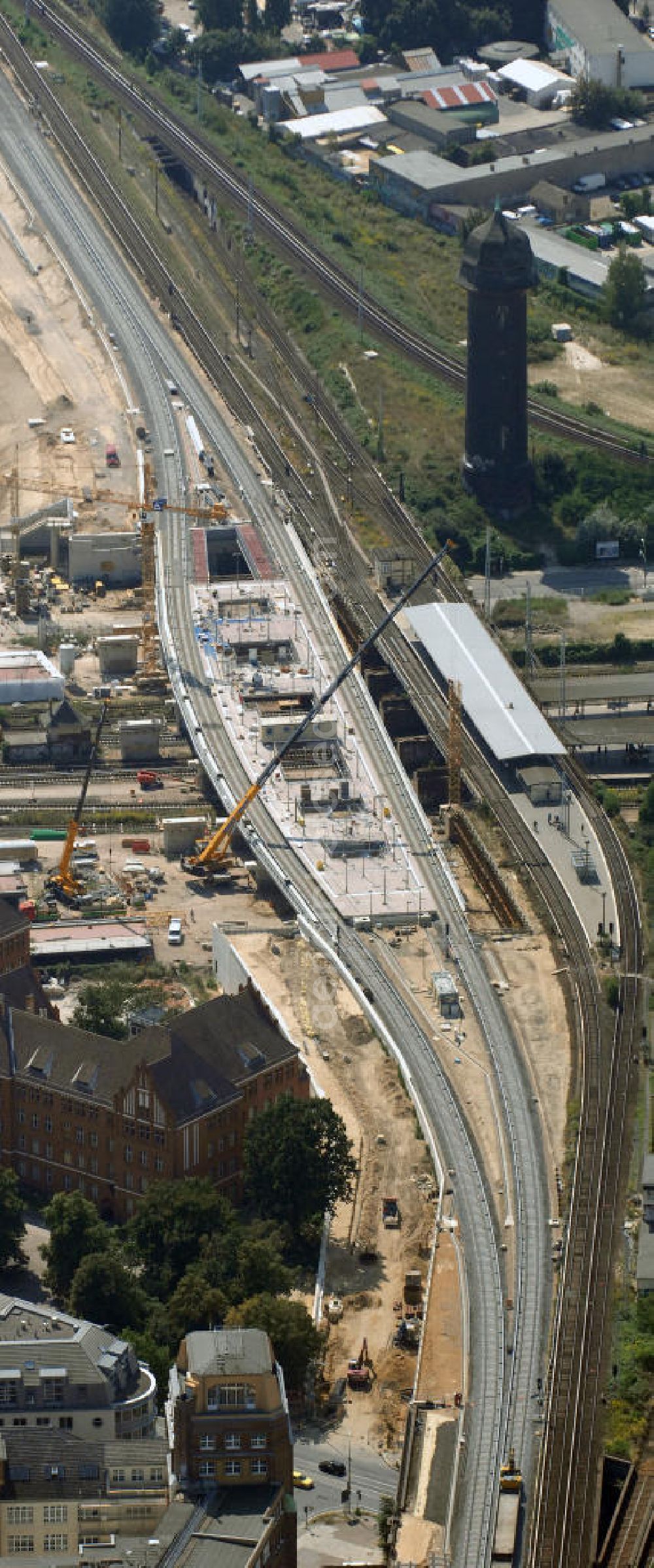 Aerial photograph Berlin - Blick auf den Um- und Neubau des Berliner S-Bahnhofs Ostkreuz. Der Bahnhof wurde bereits im Jahr 1882 eröffnet und ist somit stark sanierungsbedürftig. Teile der Neubauten führt die EUROVIA Beton GmbH aus. Weiterhin beteiligt ist das Unternehmen VEPRO Verkehrsbauprojekt GmbH. Kontakt EUROVIA: EUROVIA BEton GmbH, Niederlassung Ingenieurbau und Zweigniederlassung Cottbus, Gewerbeparkstraße 17, 03099 Kolkwitz, Tel. +49(0)355 35552 3, Fax +49(0)355 35552 52, EMail: ingenieurbau@eurovia.de; Kontakt VEPRO: Verkehrsbau Projekt GmbH, Storkower Str. 132, 10407 Berlin, Tel. +49(0)30 42194 0, Fax +49(0)30 42194 221