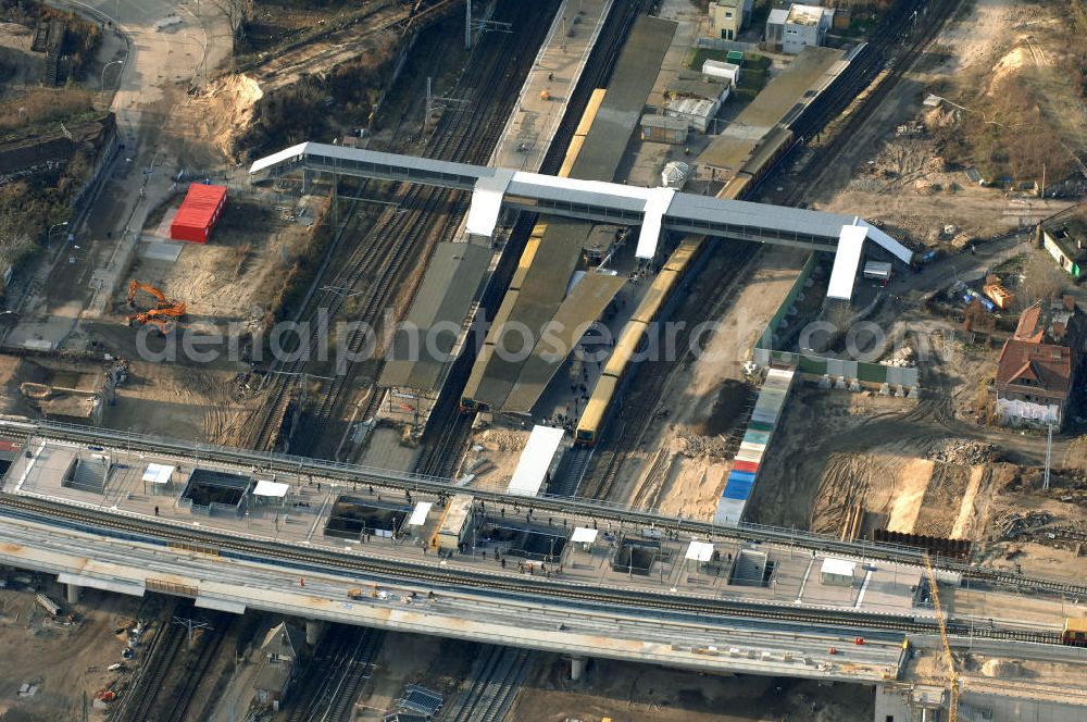 Aerial image Berlin - Blick auf den Um- und Neubau des Berliner S-Bahnhofs Ostkreuz. Der Bahnhof wurde bereits im Jahr 1882 eröffnet und ist somit stark sanierungsbedürftig. Teile der Neubauten führt die EUROVIA Beton GmbH aus. Weiterhin beteiligt ist das Unternehmen VEPRO Verkehrsbauprojekt GmbH. Kontakt EUROVIA: EUROVIA BEton GmbH, Niederlassung Ingenieurbau und Zweigniederlassung Cottbus, Gewerbeparkstraße 17, 03099 Kolkwitz, Tel. +49(0)355 35552 3, Fax +49(0)355 35552 52, EMail: ingenieurbau@eurovia.de; Kontakt VEPRO: Verkehrsbau Projekt GmbH, Storkower Str. 132, 10407 Berlin, Tel. +49(0)30 42194 0, Fax +49(0)30 42194 221