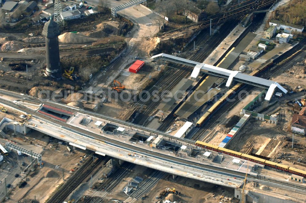 Aerial photograph Berlin - Blick auf den Um- und Neubau des Berliner S-Bahnhofs Ostkreuz. Der Bahnhof wurde bereits im Jahr 1882 eröffnet und ist somit stark sanierungsbedürftig. Teile der Neubauten führt die EUROVIA Beton GmbH aus. Weiterhin beteiligt ist das Unternehmen VEPRO Verkehrsbauprojekt GmbH. Kontakt EUROVIA: EUROVIA BEton GmbH, Niederlassung Ingenieurbau und Zweigniederlassung Cottbus, Gewerbeparkstraße 17, 03099 Kolkwitz, Tel. +49(0)355 35552 3, Fax +49(0)355 35552 52, EMail: ingenieurbau@eurovia.de; Kontakt VEPRO: Verkehrsbau Projekt GmbH, Storkower Str. 132, 10407 Berlin, Tel. +49(0)30 42194 0, Fax +49(0)30 42194 221