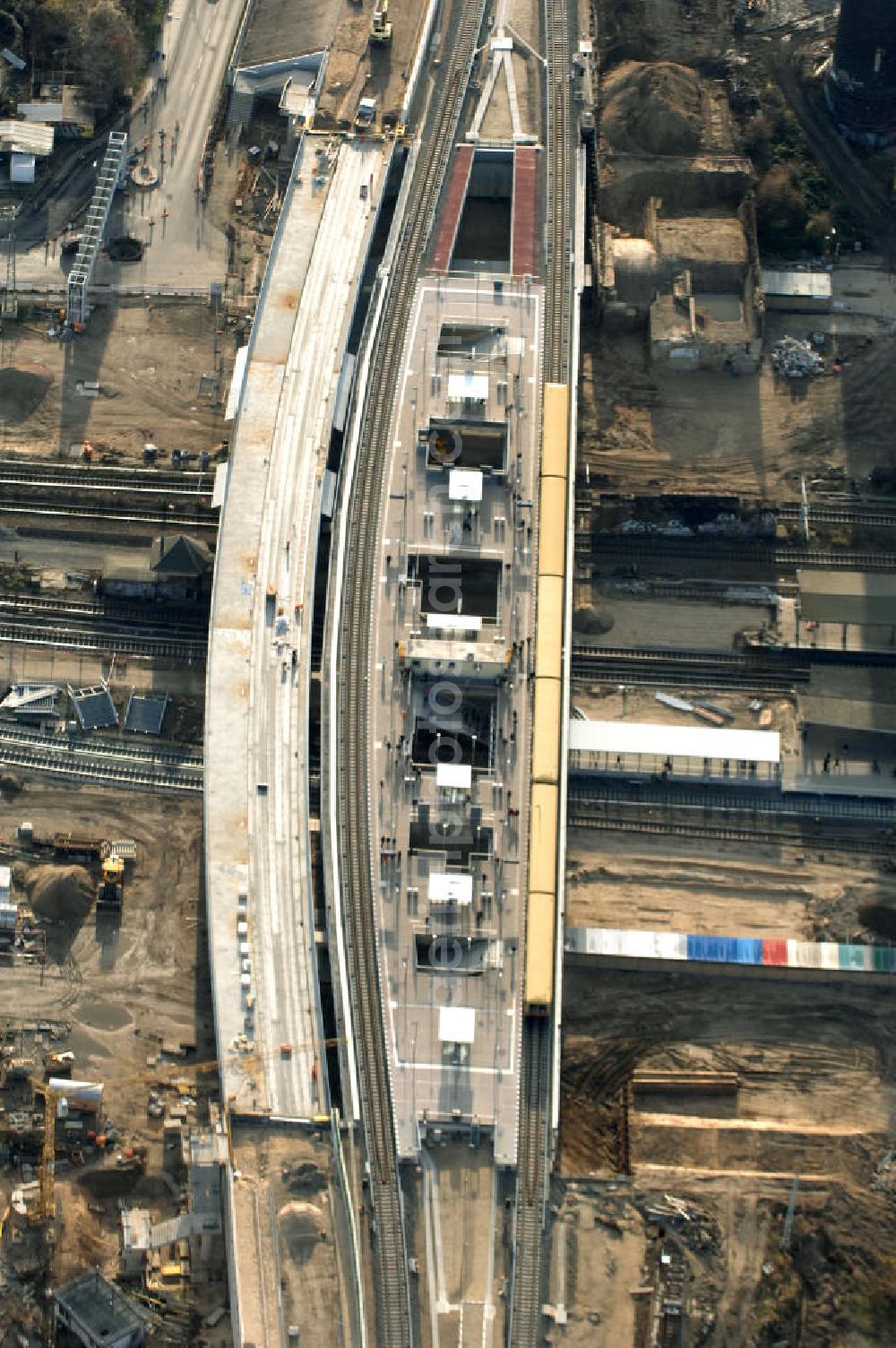 Aerial image Berlin - Blick auf den Um- und Neubau des Berliner S-Bahnhofs Ostkreuz. Der Bahnhof wurde bereits im Jahr 1882 eröffnet und ist somit stark sanierungsbedürftig. Teile der Neubauten führt die EUROVIA Beton GmbH aus. Weiterhin beteiligt ist das Unternehmen VEPRO Verkehrsbauprojekt GmbH. Kontakt EUROVIA: EUROVIA BEton GmbH, Niederlassung Ingenieurbau und Zweigniederlassung Cottbus, Gewerbeparkstraße 17, 03099 Kolkwitz, Tel. +49(0)355 35552 3, Fax +49(0)355 35552 52, EMail: ingenieurbau@eurovia.de; Kontakt VEPRO: Verkehrsbau Projekt GmbH, Storkower Str. 132, 10407 Berlin, Tel. +49(0)30 42194 0, Fax +49(0)30 42194 221