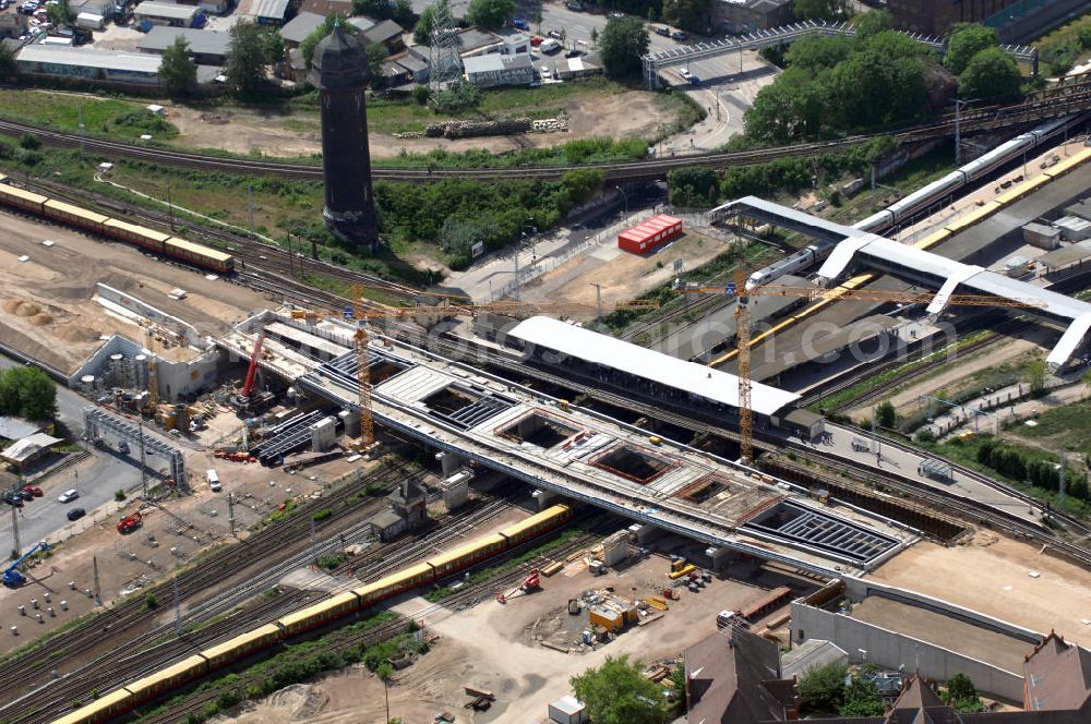 Berlin from the bird's eye view: Blick auf den Um- und Neubau des Berliner S-Bahnhofs Ostkreuz. Der Bahnhof wurde bereits im Jahr 1882 eröffnet und ist somit stark sanierungsbedürftig. Teile der Neubauten führt die EUROVIA Beton GmbH aus. Weiterhin beteiligt ist das Unternehmen VEPRO Verkehrsbauprojekt GmbH. Kontakt EUROVIA: EUROVIA BEton GmbH, Niederlassung Ingenieurbau und Zweigniederlassung Cottbus, Gewerbeparkstraße 17, 03099 Kolkwitz, Tel. +49(0)355 35552 3, Fax +49(0)355 35552 52, EMail: ingenieurbau@eurovia.de; Kontakt VEPRO: Verkehrsbau Projekt GmbH, Storkower Str. 132, 10407 Berlin, Tel. +49(0)30 42194 0, Fax +49(0)30 42194 221