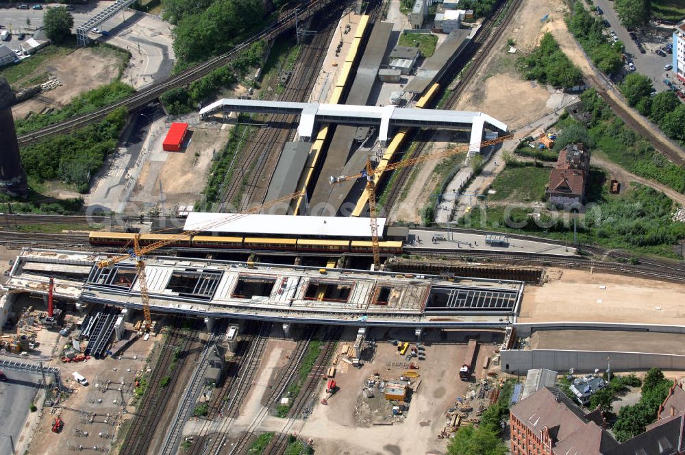 Aerial image Berlin - Blick auf den Um- und Neubau des Berliner S-Bahnhofs Ostkreuz. Der Bahnhof wurde bereits im Jahr 1882 eröffnet und ist somit stark sanierungsbedürftig. Teile der Neubauten führt die EUROVIA Beton GmbH aus. Weiterhin beteiligt ist das Unternehmen VEPRO Verkehrsbauprojekt GmbH. Kontakt EUROVIA: EUROVIA BEton GmbH, Niederlassung Ingenieurbau und Zweigniederlassung Cottbus, Gewerbeparkstraße 17, 03099 Kolkwitz, Tel. +49(0)355 35552 3, Fax +49(0)355 35552 52, EMail: ingenieurbau@eurovia.de; Kontakt VEPRO: Verkehrsbau Projekt GmbH, Storkower Str. 132, 10407 Berlin, Tel. +49(0)30 42194 0, Fax +49(0)30 42194 221