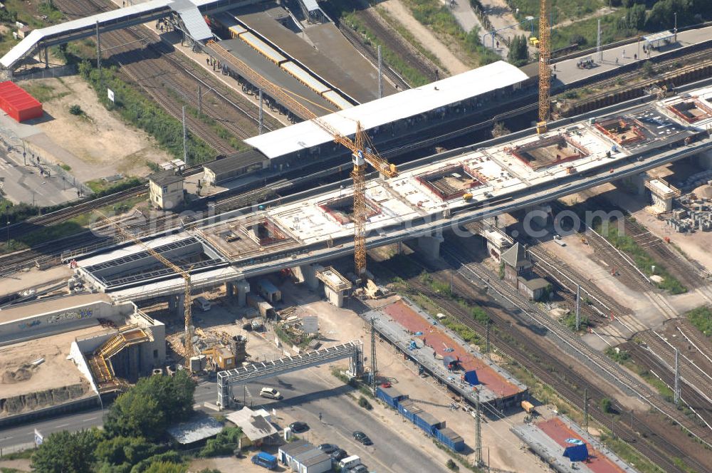 Aerial photograph Berlin - Blick auf den Um- und Neubau des Berliner S-Bahnhofs Ostkreuz. Der Bahnhof wurde bereits im Jahr 1882 eröffnet und ist somit stark sanierungsbedürftig. Teile der Neubauten führt die EUROVIA Beton GmbH aus. Weiterhin beteiligt ist das Unternehmen VEPRO Verkehrsbauprojekt GmbH. Kontakt EUROVIA: EUROVIA BEton GmbH, Niederlassung Ingenieurbau und Zweigniederlassung Cottbus, Gewerbeparkstraße 17, 03099 Kolkwitz, Tel. +49(0)355 35552 3, Fax +49(0)355 35552 52, EMail: ingenieurbau@eurovia.de; Kontakt VEPRO: Verkehrsbau Projekt GmbH, Storkower Str. 132, 10407 Berlin, Tel. +49(0)30 42194 0, Fax +49(0)30 42194 221