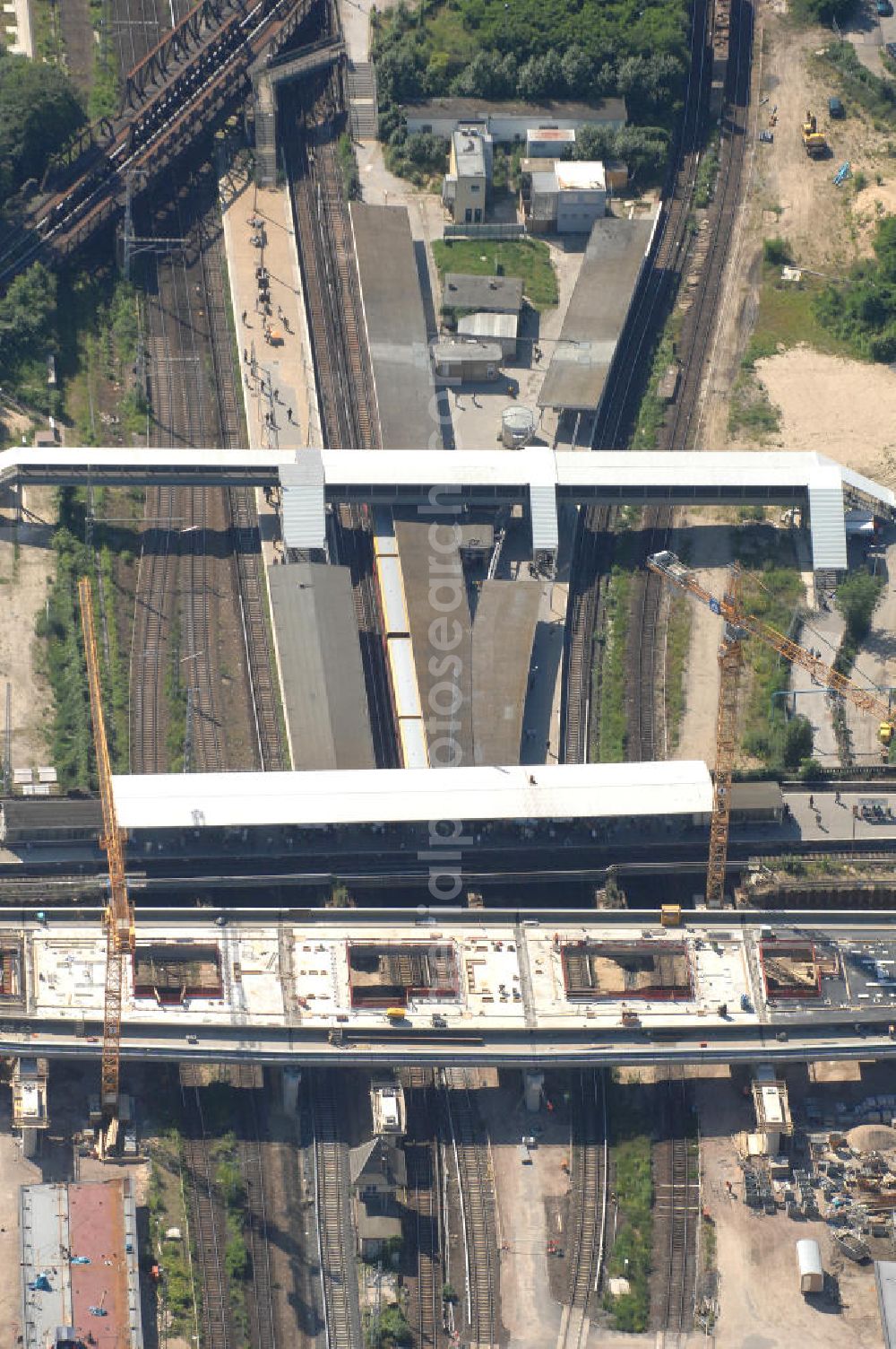 Berlin from the bird's eye view: Blick auf den Um- und Neubau des Berliner S-Bahnhofs Ostkreuz. Der Bahnhof wurde bereits im Jahr 1882 eröffnet und ist somit stark sanierungsbedürftig. Teile der Neubauten führt die EUROVIA Beton GmbH aus. Weiterhin beteiligt ist das Unternehmen VEPRO Verkehrsbauprojekt GmbH. Kontakt EUROVIA: EUROVIA BEton GmbH, Niederlassung Ingenieurbau und Zweigniederlassung Cottbus, Gewerbeparkstraße 17, 03099 Kolkwitz, Tel. +49(0)355 35552 3, Fax +49(0)355 35552 52, EMail: ingenieurbau@eurovia.de; Kontakt VEPRO: Verkehrsbau Projekt GmbH, Storkower Str. 132, 10407 Berlin, Tel. +49(0)30 42194 0, Fax +49(0)30 42194 221