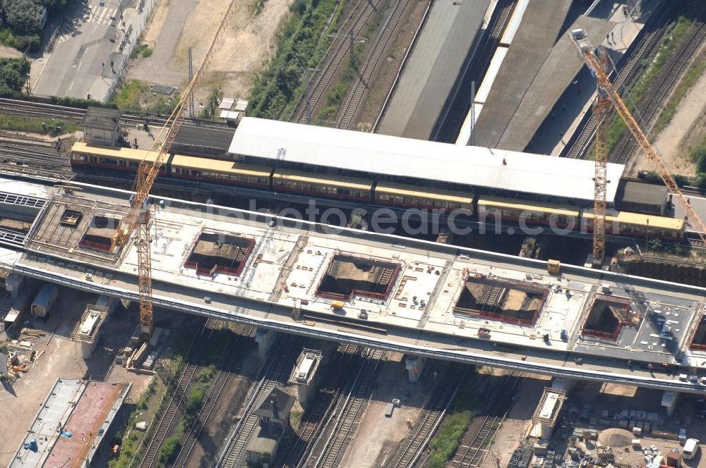 Aerial photograph Berlin - Blick auf den Um- und Neubau des Berliner S-Bahnhofs Ostkreuz. Der Bahnhof wurde bereits im Jahr 1882 eröffnet und ist somit stark sanierungsbedürftig. Teile der Neubauten führt die EUROVIA Beton GmbH aus. Weiterhin beteiligt ist das Unternehmen VEPRO Verkehrsbauprojekt GmbH. Kontakt EUROVIA: EUROVIA BEton GmbH, Niederlassung Ingenieurbau und Zweigniederlassung Cottbus, Gewerbeparkstraße 17, 03099 Kolkwitz, Tel. +49(0)355 35552 3, Fax +49(0)355 35552 52, EMail: ingenieurbau@eurovia.de; Kontakt VEPRO: Verkehrsbau Projekt GmbH, Storkower Str. 132, 10407 Berlin, Tel. +49(0)30 42194 0, Fax +49(0)30 42194 221