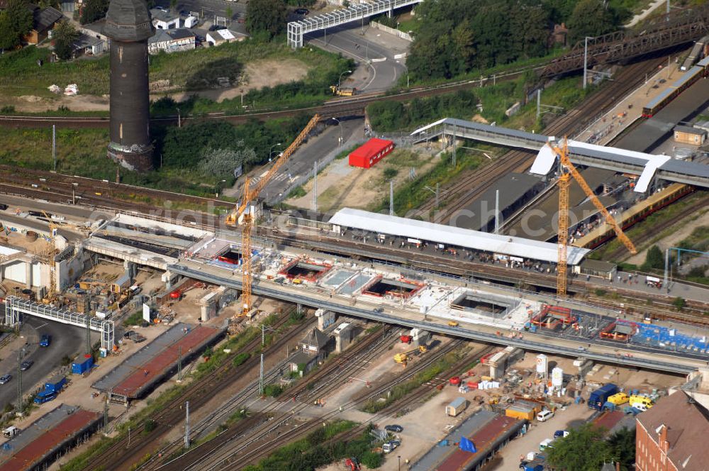 Berlin from the bird's eye view: Blick auf den Um- und Neubau des Berliner S-Bahnhofs Ostkreuz. Der Bahnhof wurde bereits im Jahr 1882 eröffnet und ist somit stark sanierungsbedürftig. Teile der Neubauten führt die EUROVIA Beton GmbH aus. Weiterhin beteiligt ist das Unternehmen VEPRO Verkehrsbauprojekt GmbH. Kontakt EUROVIA: EUROVIA BEton GmbH, Niederlassung Ingenieurbau und Zweigniederlassung Cottbus, Gewerbeparkstraße 17, 03099 Kolkwitz, Tel. +49(0)355 35552 3, Fax +49(0)355 35552 52, EMail: ingenieurbau@eurovia.de; Kontakt VEPRO: Verkehrsbau Projekt GmbH, Storkower Str. 132, 10407 Berlin, Tel. +49(0)30 42194 0, Fax +49(0)30 42194 221