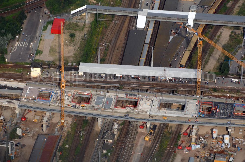 Aerial image Berlin - Blick auf den Um- und Neubau des Berliner S-Bahnhofs Ostkreuz. Der Bahnhof wurde bereits im Jahr 1882 eröffnet und ist somit stark sanierungsbedürftig. Teile der Neubauten führt die EUROVIA Beton GmbH aus. Weiterhin beteiligt ist das Unternehmen VEPRO Verkehrsbauprojekt GmbH. Kontakt EUROVIA: EUROVIA BEton GmbH, Niederlassung Ingenieurbau und Zweigniederlassung Cottbus, Gewerbeparkstraße 17, 03099 Kolkwitz, Tel. +49(0)355 35552 3, Fax +49(0)355 35552 52, EMail: ingenieurbau@eurovia.de; Kontakt VEPRO: Verkehrsbau Projekt GmbH, Storkower Str. 132, 10407 Berlin, Tel. +49(0)30 42194 0, Fax +49(0)30 42194 221