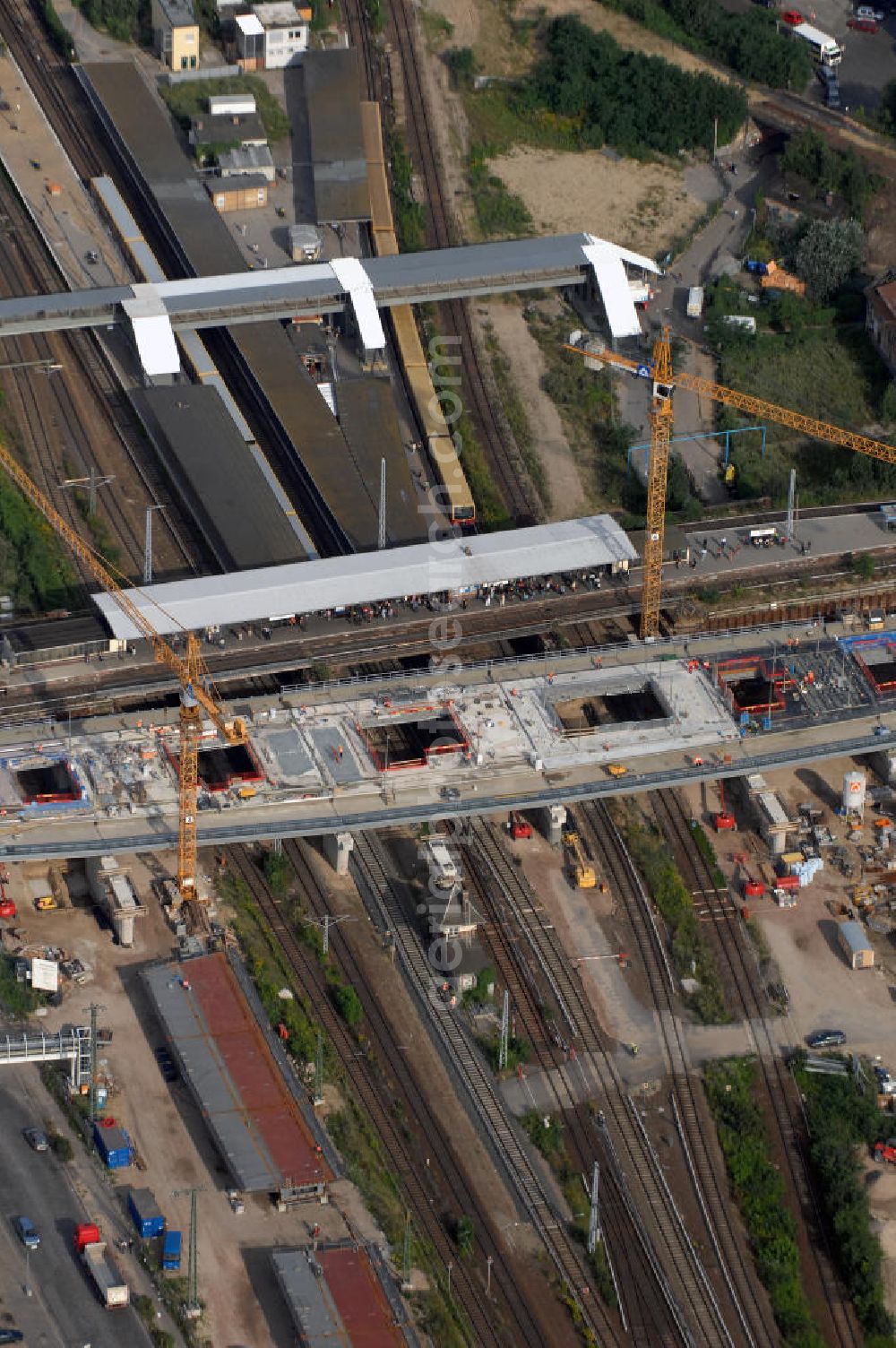 Berlin from the bird's eye view: Blick auf den Um- und Neubau des Berliner S-Bahnhofs Ostkreuz. Der Bahnhof wurde bereits im Jahr 1882 eröffnet und ist somit stark sanierungsbedürftig. Teile der Neubauten führt die EUROVIA Beton GmbH aus. Weiterhin beteiligt ist das Unternehmen VEPRO Verkehrsbauprojekt GmbH. Kontakt EUROVIA: EUROVIA BEton GmbH, Niederlassung Ingenieurbau und Zweigniederlassung Cottbus, Gewerbeparkstraße 17, 03099 Kolkwitz, Tel. +49(0)355 35552 3, Fax +49(0)355 35552 52, EMail: ingenieurbau@eurovia.de; Kontakt VEPRO: Verkehrsbau Projekt GmbH, Storkower Str. 132, 10407 Berlin, Tel. +49(0)30 42194 0, Fax +49(0)30 42194 221