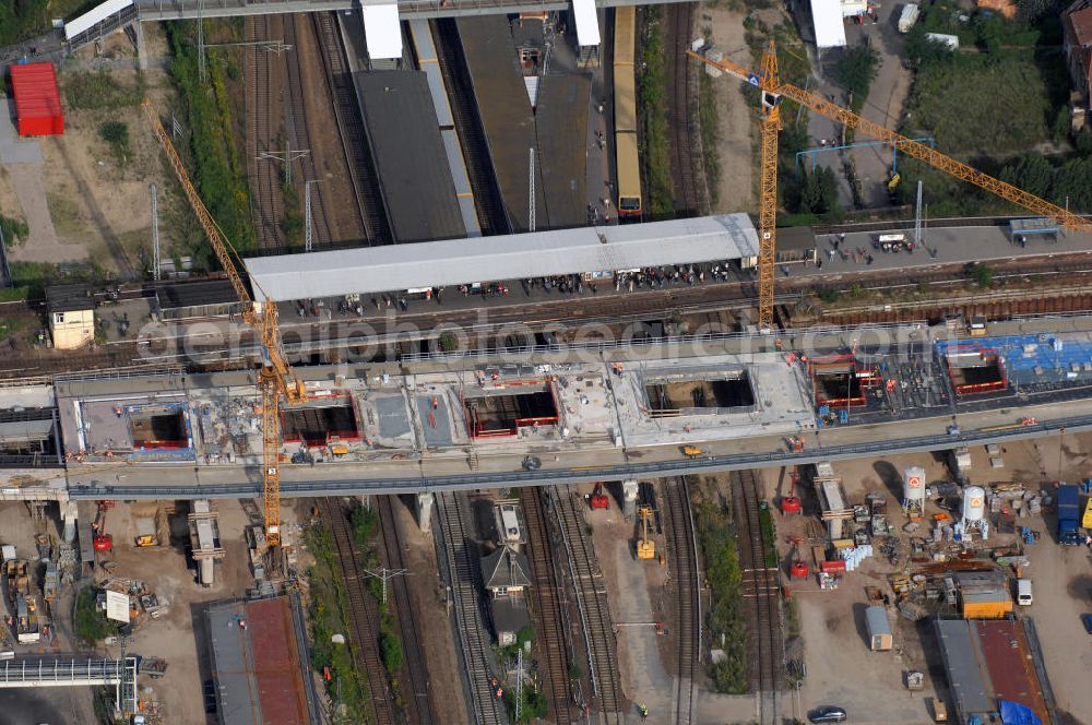 Aerial image Berlin - Blick auf den Um- und Neubau des Berliner S-Bahnhofs Ostkreuz. Der Bahnhof wurde bereits im Jahr 1882 eröffnet und ist somit stark sanierungsbedürftig. Teile der Neubauten führt die EUROVIA Beton GmbH aus. Weiterhin beteiligt ist das Unternehmen VEPRO Verkehrsbauprojekt GmbH. Kontakt EUROVIA: EUROVIA BEton GmbH, Niederlassung Ingenieurbau und Zweigniederlassung Cottbus, Gewerbeparkstraße 17, 03099 Kolkwitz, Tel. +49(0)355 35552 3, Fax +49(0)355 35552 52, EMail: ingenieurbau@eurovia.de; Kontakt VEPRO: Verkehrsbau Projekt GmbH, Storkower Str. 132, 10407 Berlin, Tel. +49(0)30 42194 0, Fax +49(0)30 42194 221