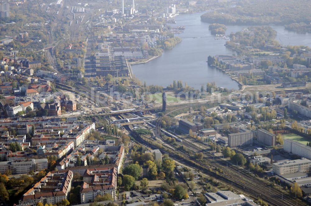 Aerial image Berlin - Blick auf den Um- und Neubau des Berliner S-Bahnhofs Ostkreuz. Der Bahnhof wurde bereits im Jahr 1882 eröffnet und ist somit stark sanierungsbedürftig. Die Arbeiten begannen im Oktober 2006. Teile der Neubauten führt die EUROVIA Beton GmbH aus. Weiterhin beteiligt ist das Unternehmen VEPRO Verkehrsbauprojekt GmbH. Kontakt EUROVIA: EUROVIA BEton GmbH, Niederlassung Ingenieurbau und Zweigniederlassung Cottbus, Gewerbeparkstraße 17, 03099 Kolkwitz, Tel. +49(0)355 35552 3, Fax +49(0)355 35552 52, EMail: ingenieurbau@eurovia.de; Kontakt VEPRO: Verkehrsbau Projekt GmbH, Storkower Str. 132, 10407 Berlin, Tel. +49(0)30 42194 0, Fax +49(0)30 42194 221