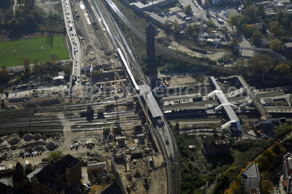 Aerial image Berlin - Blick auf den Um- und Neubau des Berliner S-Bahnhofs Ostkreuz. Der Bahnhof wurde bereits im Jahr 1882 eröffnet und ist somit stark sanierungsbedürftig. Die Arbeiten begannen im Oktober 2006. Teile der Neubauten führt die EUROVIA Beton GmbH aus. Weiterhin beteiligt ist das Unternehmen VEPRO Verkehrsbauprojekt GmbH. Kontakt EUROVIA: EUROVIA BEton GmbH, Niederlassung Ingenieurbau und Zweigniederlassung Cottbus, Gewerbeparkstraße 17, 03099 Kolkwitz, Tel. +49(0)355 35552 3, Fax +49(0)355 35552 52, EMail: ingenieurbau@eurovia.de; Kontakt VEPRO: Verkehrsbau Projekt GmbH, Storkower Str. 132, 10407 Berlin, Tel. +49(0)30 42194 0, Fax +49(0)30 42194 221