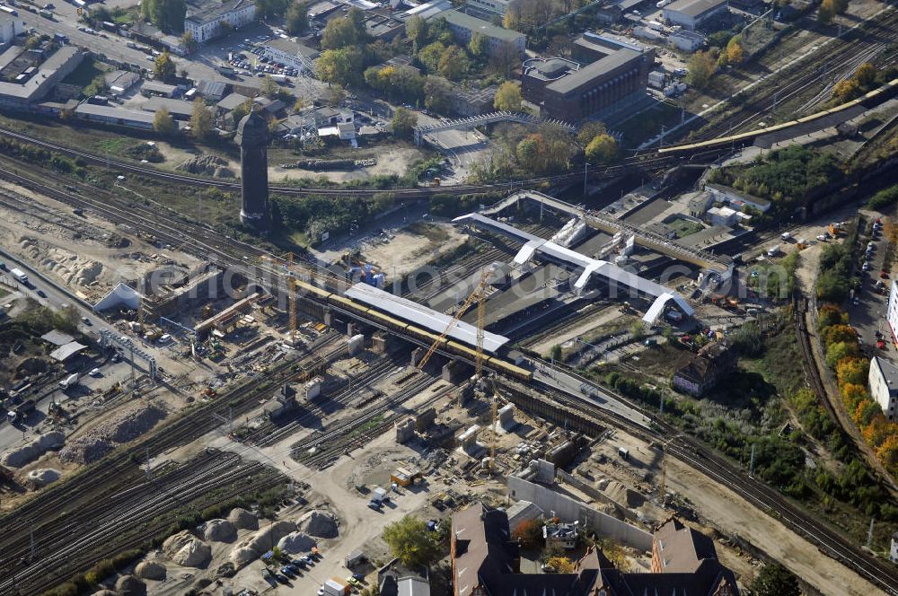 Berlin from above - Blick auf den Um- und Neubau des Berliner S-Bahnhofs Ostkreuz. Der Bahnhof wurde bereits im Jahr 1882 eröffnet und ist somit stark sanierungsbedürftig. Die Arbeiten begannen im Oktober 2006. Teile der Neubauten führt die EUROVIA Beton GmbH aus. Weiterhin beteiligt ist das Unternehmen VEPRO Verkehrsbauprojekt GmbH. Kontakt EUROVIA: EUROVIA BEton GmbH, Niederlassung Ingenieurbau und Zweigniederlassung Cottbus, Gewerbeparkstraße 17, 03099 Kolkwitz, Tel. +49(0)355 35552 3, Fax +49(0)355 35552 52, EMail: ingenieurbau@eurovia.de; Kontakt VEPRO: Verkehrsbau Projekt GmbH, Storkower Str. 132, 10407 Berlin, Tel. +49(0)30 42194 0, Fax +49(0)30 42194 221