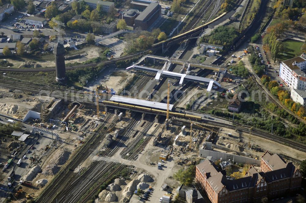 Berlin from the bird's eye view: Blick auf den Um- und Neubau des Berliner S-Bahnhofs Ostkreuz. Der Bahnhof wurde bereits im Jahr 1882 eröffnet und ist somit stark sanierungsbedürftig. Die Arbeiten begannen im Oktober 2006. Teile der Neubauten führt die EUROVIA Beton GmbH aus. Weiterhin beteiligt ist das Unternehmen VEPRO Verkehrsbauprojekt GmbH. Kontakt EUROVIA: EUROVIA BEton GmbH, Niederlassung Ingenieurbau und Zweigniederlassung Cottbus, Gewerbeparkstraße 17, 03099 Kolkwitz, Tel. +49(0)355 35552 3, Fax +49(0)355 35552 52, EMail: ingenieurbau@eurovia.de; Kontakt VEPRO: Verkehrsbau Projekt GmbH, Storkower Str. 132, 10407 Berlin, Tel. +49(0)30 42194 0, Fax +49(0)30 42194 221