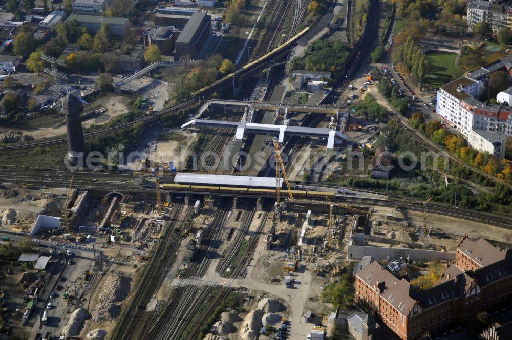 Aerial image Berlin - Blick auf den Um- und Neubau des Berliner S-Bahnhofs Ostkreuz. Der Bahnhof wurde bereits im Jahr 1882 eröffnet und ist somit stark sanierungsbedürftig. Die Arbeiten begannen im Oktober 2006. Teile der Neubauten führt die EUROVIA Beton GmbH aus. Weiterhin beteiligt ist das Unternehmen VEPRO Verkehrsbauprojekt GmbH. Kontakt EUROVIA: EUROVIA BEton GmbH, Niederlassung Ingenieurbau und Zweigniederlassung Cottbus, Gewerbeparkstraße 17, 03099 Kolkwitz, Tel. +49(0)355 35552 3, Fax +49(0)355 35552 52, EMail: ingenieurbau@eurovia.de; Kontakt VEPRO: Verkehrsbau Projekt GmbH, Storkower Str. 132, 10407 Berlin, Tel. +49(0)30 42194 0, Fax +49(0)30 42194 221