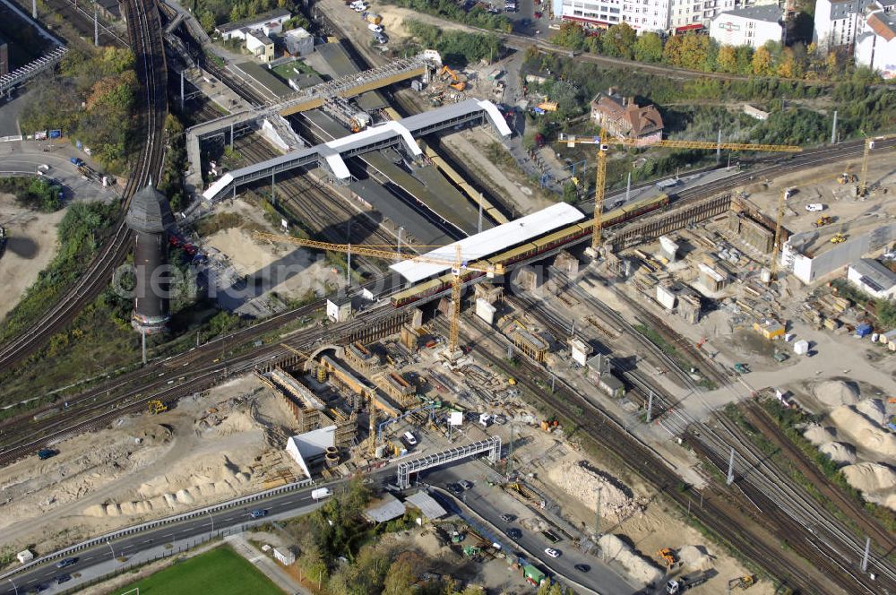 Aerial image Berlin - Blick auf den Um- und Neubau des Berliner S-Bahnhofs Ostkreuz. Der Bahnhof wurde bereits im Jahr 1882 eröffnet und ist somit stark sanierungsbedürftig. Die Arbeiten begannen im Oktober 2006. Teile der Neubauten führt die EUROVIA Beton GmbH aus. Weiterhin beteiligt ist das Unternehmen VEPRO Verkehrsbauprojekt GmbH. Kontakt EUROVIA: EUROVIA BEton GmbH, Niederlassung Ingenieurbau und Zweigniederlassung Cottbus, Gewerbeparkstraße 17, 03099 Kolkwitz, Tel. +49(0)355 35552 3, Fax +49(0)355 35552 52, EMail: ingenieurbau@eurovia.de; Kontakt VEPRO: Verkehrsbau Projekt GmbH, Storkower Str. 132, 10407 Berlin, Tel. +49(0)30 42194 0, Fax +49(0)30 42194 221