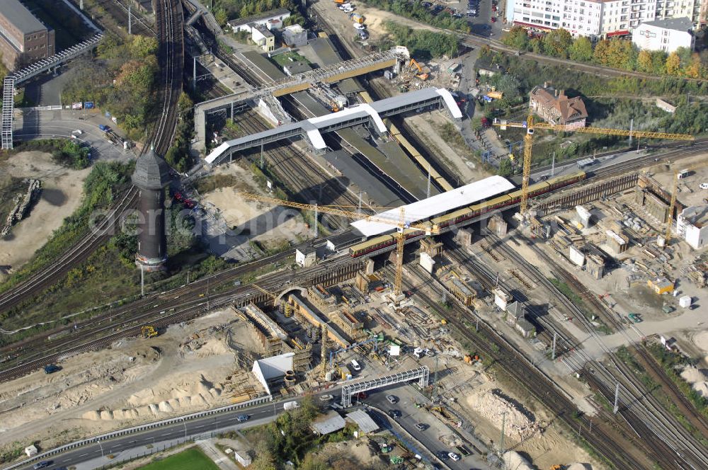 Aerial photograph Berlin - Blick auf den Um- und Neubau des Berliner S-Bahnhofs Ostkreuz. Der Bahnhof wurde bereits im Jahr 1882 eröffnet und ist somit stark sanierungsbedürftig. Die Arbeiten begannen im Oktober 2006. Teile der Neubauten führt die EUROVIA Beton GmbH aus. Weiterhin beteiligt ist das Unternehmen VEPRO Verkehrsbauprojekt GmbH. Kontakt EUROVIA: EUROVIA BEton GmbH, Niederlassung Ingenieurbau und Zweigniederlassung Cottbus, Gewerbeparkstraße 17, 03099 Kolkwitz, Tel. +49(0)355 35552 3, Fax +49(0)355 35552 52, EMail: ingenieurbau@eurovia.de; Kontakt VEPRO: Verkehrsbau Projekt GmbH, Storkower Str. 132, 10407 Berlin, Tel. +49(0)30 42194 0, Fax +49(0)30 42194 221