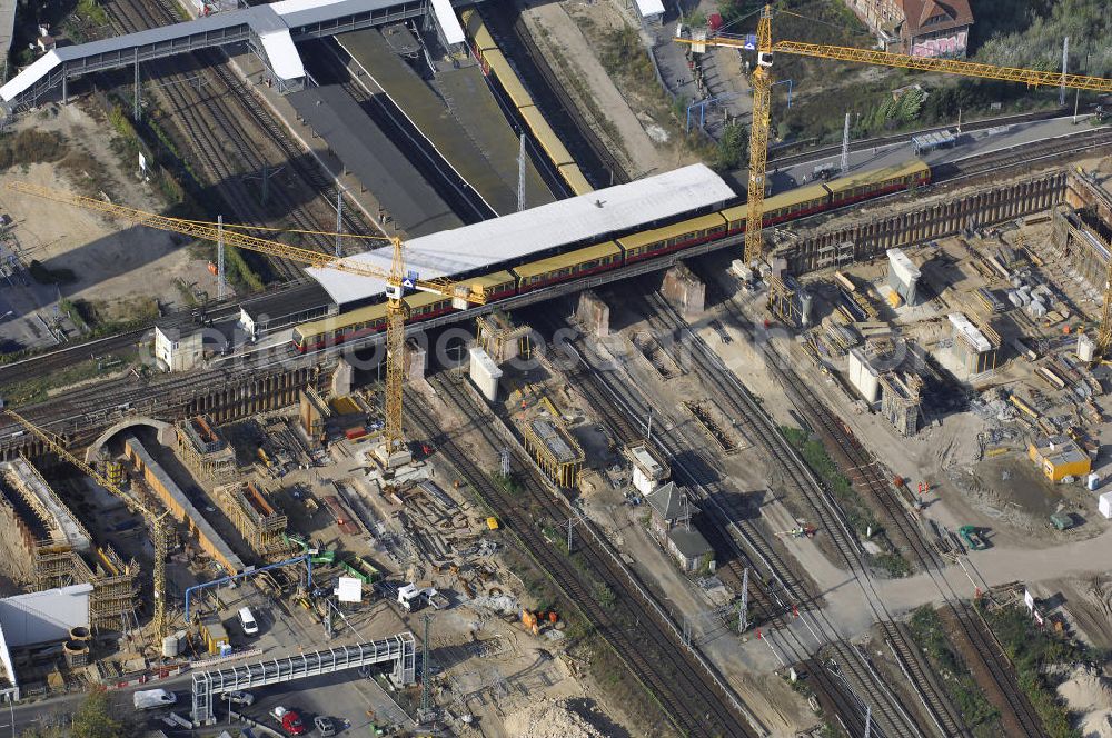 Berlin from the bird's eye view: Blick auf den Um- und Neubau des Berliner S-Bahnhofs Ostkreuz. Der Bahnhof wurde bereits im Jahr 1882 eröffnet und ist somit stark sanierungsbedürftig. Die Arbeiten begannen im Oktober 2006. Teile der Neubauten führt die EUROVIA Beton GmbH aus. Weiterhin beteiligt ist das Unternehmen VEPRO Verkehrsbauprojekt GmbH. Kontakt EUROVIA: EUROVIA BEton GmbH, Niederlassung Ingenieurbau und Zweigniederlassung Cottbus, Gewerbeparkstraße 17, 03099 Kolkwitz, Tel. +49(0)355 35552 3, Fax +49(0)355 35552 52, EMail: ingenieurbau@eurovia.de; Kontakt VEPRO: Verkehrsbau Projekt GmbH, Storkower Str. 132, 10407 Berlin, Tel. +49(0)30 42194 0, Fax +49(0)30 42194 221