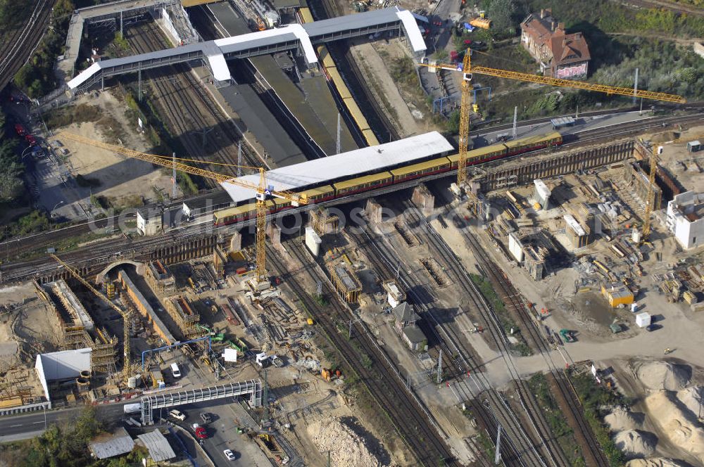 Aerial image Berlin - Blick auf den Um- und Neubau des Berliner S-Bahnhofs Ostkreuz. Der Bahnhof wurde bereits im Jahr 1882 eröffnet und ist somit stark sanierungsbedürftig. Die Arbeiten begannen im Oktober 2006. Teile der Neubauten führt die EUROVIA Beton GmbH aus. Weiterhin beteiligt ist das Unternehmen VEPRO Verkehrsbauprojekt GmbH. Kontakt EUROVIA: EUROVIA BEton GmbH, Niederlassung Ingenieurbau und Zweigniederlassung Cottbus, Gewerbeparkstraße 17, 03099 Kolkwitz, Tel. +49(0)355 35552 3, Fax +49(0)355 35552 52, EMail: ingenieurbau@eurovia.de; Kontakt VEPRO: Verkehrsbau Projekt GmbH, Storkower Str. 132, 10407 Berlin, Tel. +49(0)30 42194 0, Fax +49(0)30 42194 221