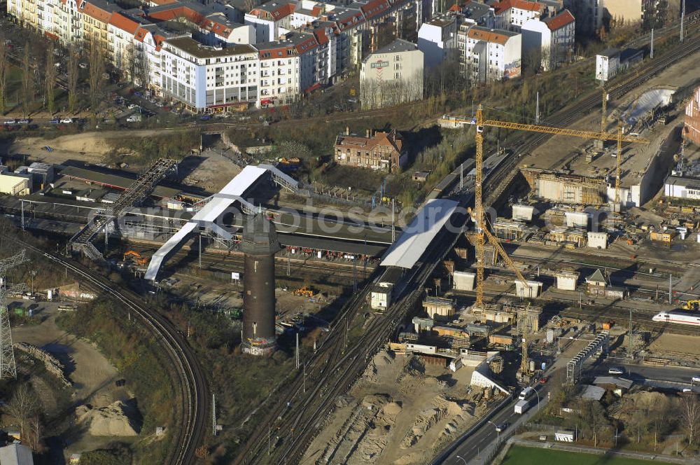 Berlin from the bird's eye view: Blick auf den Um- und Neubau des Berliner S-Bahnhofs Ostkreuz. Der Bahnhof wurde bereits im Jahr 1882 eröffnet und ist somit stark sanierungsbedürftig. Die Arbeiten begannen im Oktober 2006. Teile der Neubauten führt die EUROVIA Beton GmbH aus. Weiterhin beteiligt ist das Unternehmen VEPRO Verkehrsbauprojekt GmbH. Kontakt EUROVIA: EUROVIA BEton GmbH, Niederlassung Ingenieurbau und Zweigniederlassung Cottbus, Gewerbeparkstraße 17, 03099 Kolkwitz, Tel. +49(0)355 35552 3, Fax +49(0)355 35552 52, EMail: ingenieurbau@eurovia.de; Kontakt VEPRO: Verkehrsbau Projekt GmbH, Storkower Str. 132, 10407 Berlin, Tel. +49(0)30 42194 0, Fax +49(0)30 42194 221