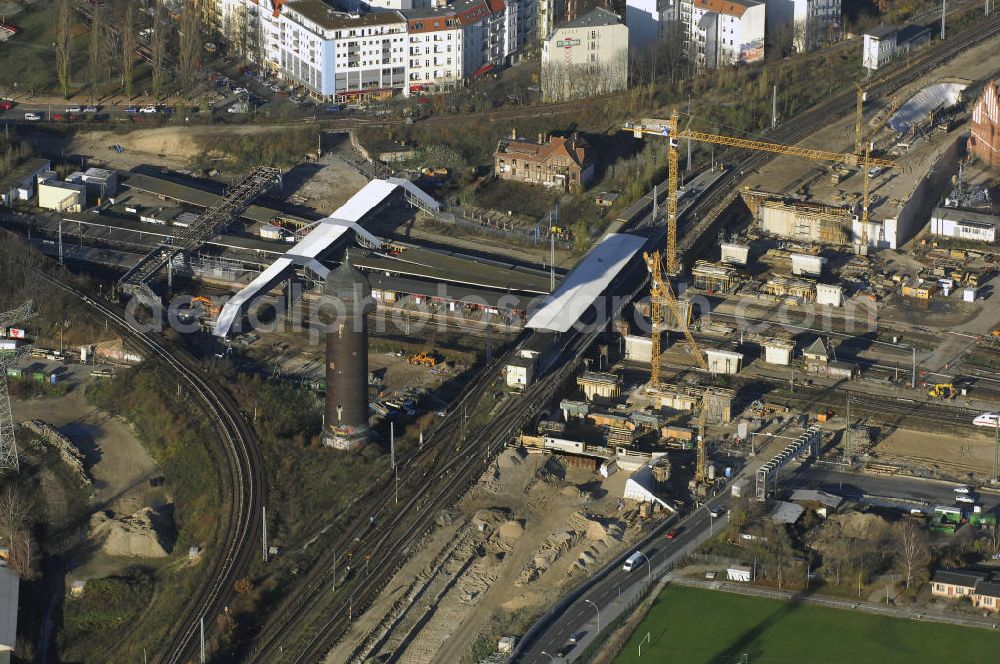 Aerial image Berlin - Blick auf den Um- und Neubau des Berliner S-Bahnhofs Ostkreuz. Der Bahnhof wurde bereits im Jahr 1882 eröffnet und ist somit stark sanierungsbedürftig. Die Arbeiten begannen im Oktober 2006. Teile der Neubauten führt die EUROVIA Beton GmbH aus. Weiterhin beteiligt ist das Unternehmen VEPRO Verkehrsbauprojekt GmbH. Kontakt EUROVIA: EUROVIA BEton GmbH, Niederlassung Ingenieurbau und Zweigniederlassung Cottbus, Gewerbeparkstraße 17, 03099 Kolkwitz, Tel. +49(0)355 35552 3, Fax +49(0)355 35552 52, EMail: ingenieurbau@eurovia.de; Kontakt VEPRO: Verkehrsbau Projekt GmbH, Storkower Str. 132, 10407 Berlin, Tel. +49(0)30 42194 0, Fax +49(0)30 42194 221