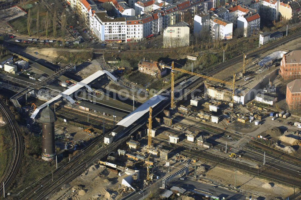 Aerial photograph Berlin - Blick auf den Um- und Neubau des Berliner S-Bahnhofs Ostkreuz. Der Bahnhof wurde bereits im Jahr 1882 eröffnet und ist somit stark sanierungsbedürftig. Die Arbeiten begannen im Oktober 2006. Teile der Neubauten führt die EUROVIA Beton GmbH aus. Weiterhin beteiligt ist das Unternehmen VEPRO Verkehrsbauprojekt GmbH. Kontakt EUROVIA: EUROVIA BEton GmbH, Niederlassung Ingenieurbau und Zweigniederlassung Cottbus, Gewerbeparkstraße 17, 03099 Kolkwitz, Tel. +49(0)355 35552 3, Fax +49(0)355 35552 52, EMail: ingenieurbau@eurovia.de; Kontakt VEPRO: Verkehrsbau Projekt GmbH, Storkower Str. 132, 10407 Berlin, Tel. +49(0)30 42194 0, Fax +49(0)30 42194 221