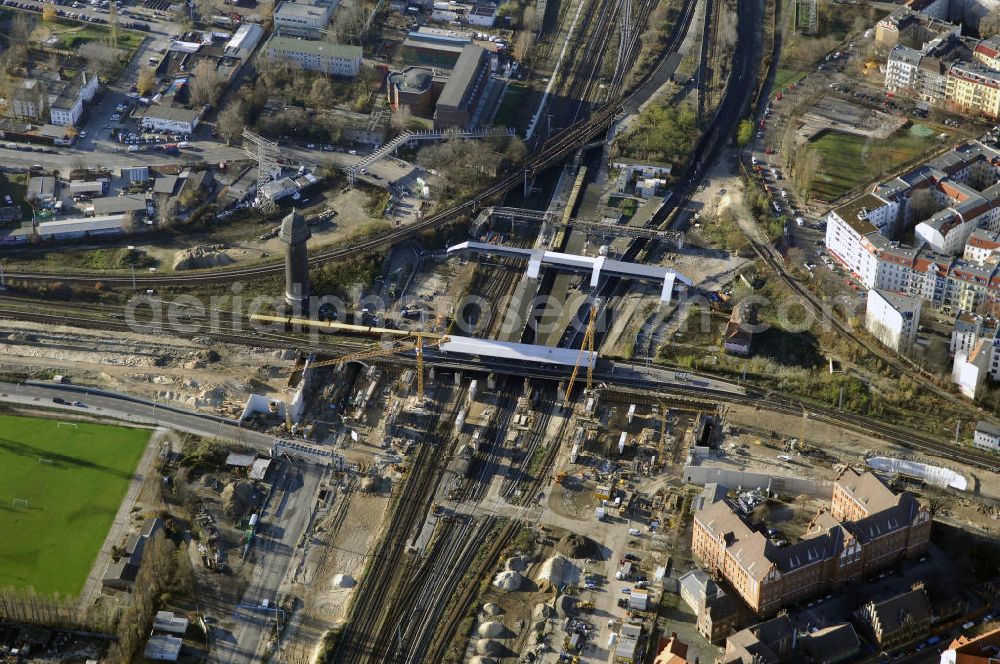 Berlin from the bird's eye view: Blick auf den Um- und Neubau des Berliner S-Bahnhofs Ostkreuz. Der Bahnhof wurde bereits im Jahr 1882 eröffnet und ist somit stark sanierungsbedürftig. Die Arbeiten begannen im Oktober 2006. Teile der Neubauten führt die EUROVIA Beton GmbH aus. Weiterhin beteiligt ist das Unternehmen VEPRO Verkehrsbauprojekt GmbH. Kontakt EUROVIA: EUROVIA BEton GmbH, Niederlassung Ingenieurbau und Zweigniederlassung Cottbus, Gewerbeparkstraße 17, 03099 Kolkwitz, Tel. +49(0)355 35552 3, Fax +49(0)355 35552 52, EMail: ingenieurbau@eurovia.de; Kontakt VEPRO: Verkehrsbau Projekt GmbH, Storkower Str. 132, 10407 Berlin, Tel. +49(0)30 42194 0, Fax +49(0)30 42194 221