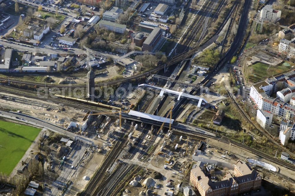 Aerial image Berlin - Blick auf den Um- und Neubau des Berliner S-Bahnhofs Ostkreuz. Der Bahnhof wurde bereits im Jahr 1882 eröffnet und ist somit stark sanierungsbedürftig. Die Arbeiten begannen im Oktober 2006. Teile der Neubauten führt die EUROVIA Beton GmbH aus. Weiterhin beteiligt ist das Unternehmen VEPRO Verkehrsbauprojekt GmbH. Kontakt EUROVIA: EUROVIA BEton GmbH, Niederlassung Ingenieurbau und Zweigniederlassung Cottbus, Gewerbeparkstraße 17, 03099 Kolkwitz, Tel. +49(0)355 35552 3, Fax +49(0)355 35552 52, EMail: ingenieurbau@eurovia.de; Kontakt VEPRO: Verkehrsbau Projekt GmbH, Storkower Str. 132, 10407 Berlin, Tel. +49(0)30 42194 0, Fax +49(0)30 42194 221