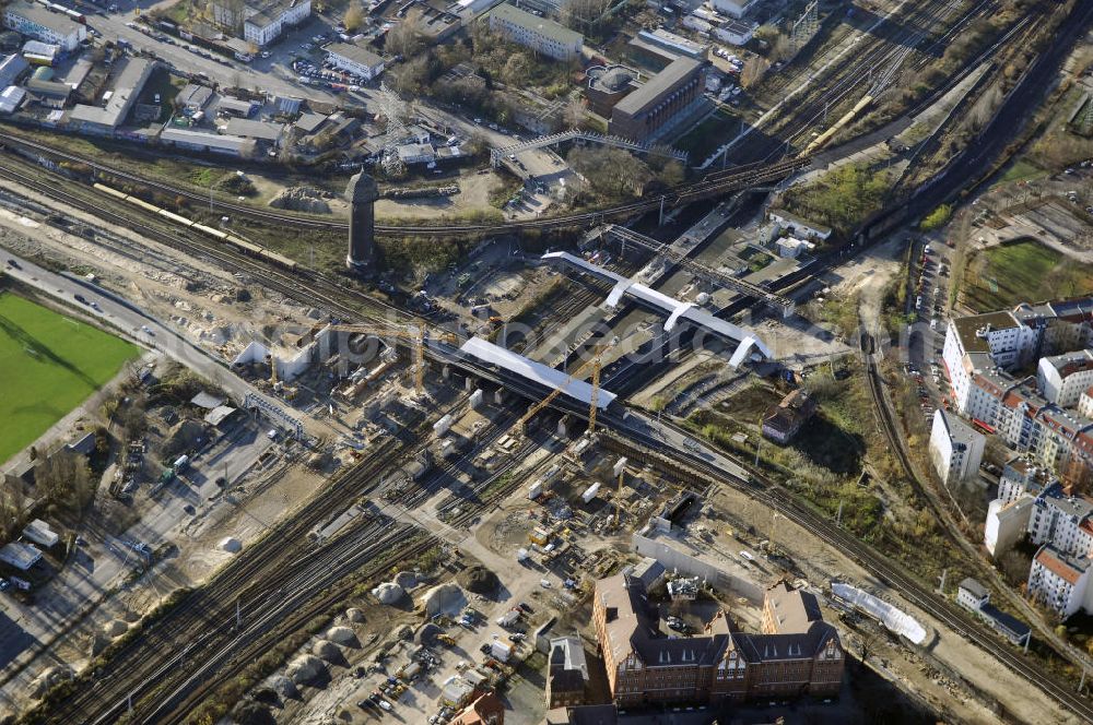 Aerial photograph Berlin - Blick auf den Um- und Neubau des Berliner S-Bahnhofs Ostkreuz. Der Bahnhof wurde bereits im Jahr 1882 eröffnet und ist somit stark sanierungsbedürftig. Die Arbeiten begannen im Oktober 2006. Teile der Neubauten führt die EUROVIA Beton GmbH aus. Weiterhin beteiligt ist das Unternehmen VEPRO Verkehrsbauprojekt GmbH. Kontakt EUROVIA: EUROVIA BEton GmbH, Niederlassung Ingenieurbau und Zweigniederlassung Cottbus, Gewerbeparkstraße 17, 03099 Kolkwitz, Tel. +49(0)355 35552 3, Fax +49(0)355 35552 52, EMail: ingenieurbau@eurovia.de; Kontakt VEPRO: Verkehrsbau Projekt GmbH, Storkower Str. 132, 10407 Berlin, Tel. +49(0)30 42194 0, Fax +49(0)30 42194 221