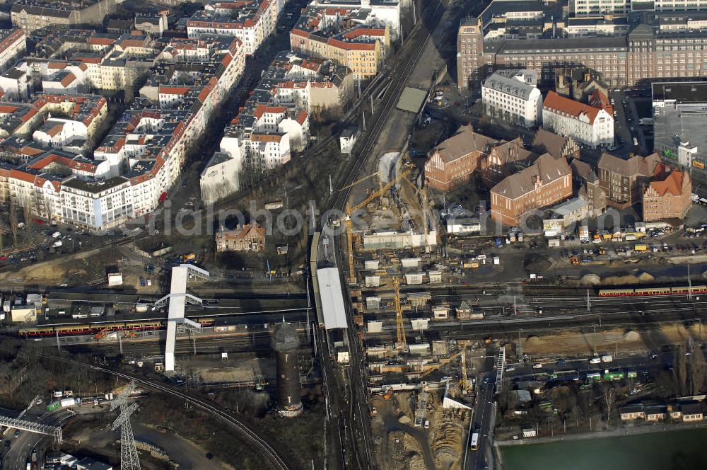 Aerial photograph Berlin - Blick auf den Um- und Neubau des Berliner S-Bahnhofs Ostkreuz. Der Bahnhof wurde bereits im Jahr 1882 eröffnet und ist somit stark sanierungsbedürftig. Teile der Neubauten führt die EUROVIA Beton GmbH aus. Weiterhin beteiligt ist das Unternehmen VEPRO Verkehrsbauprojekt GmbH. Kontakt EUROVIA: EUROVIA BEton GmbH, Niederlassung Ingenieurbau und Zweigniederlassung Cottbus, Gewerbeparkstraße 17, 03099 Kolkwitz, Tel. +49(0)355 35552 3, Fax +49(0)355 35552 52, EMail: ingenieurbau@eurovia.de; Kontakt VEPRO: Verkehrsbau Projekt GmbH, Storkower Str. 132, 10407 Berlin, Tel. +49(0)30 42194 0, Fax +49(0)30 42194 221