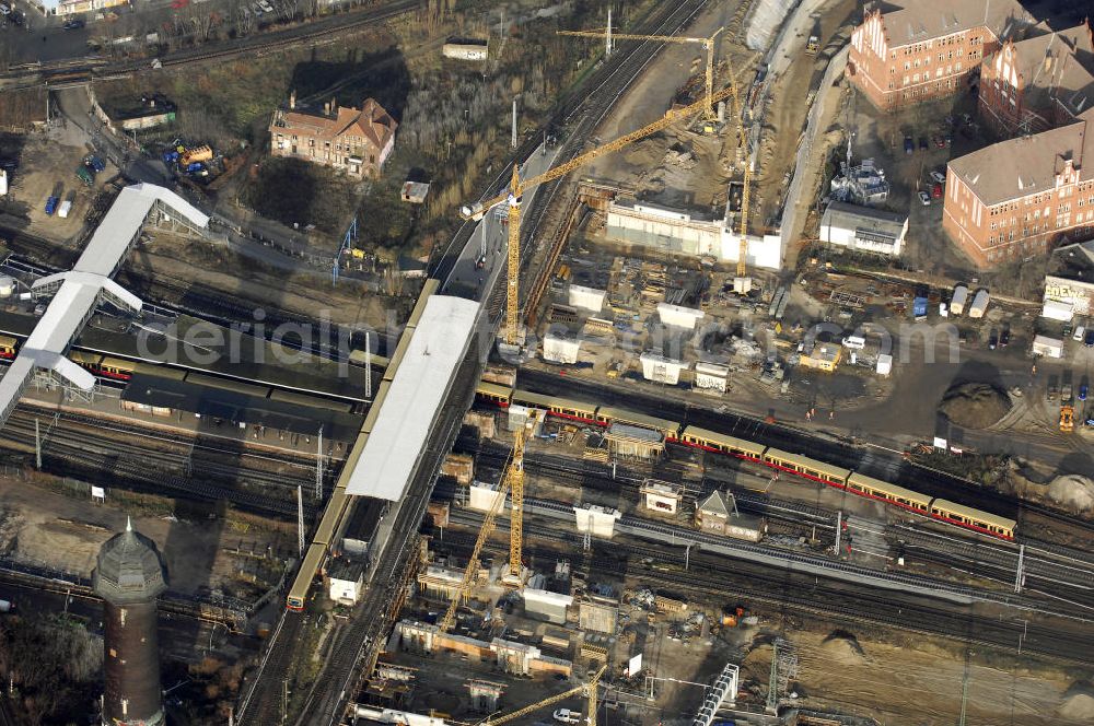 Berlin from the bird's eye view: Blick auf den Um- und Neubau des Berliner S-Bahnhofs Ostkreuz. Der Bahnhof wurde bereits im Jahr 1882 eröffnet und ist somit stark sanierungsbedürftig. Teile der Neubauten führt die EUROVIA Beton GmbH aus. Weiterhin beteiligt ist das Unternehmen VEPRO Verkehrsbauprojekt GmbH. Kontakt EUROVIA: EUROVIA BEton GmbH, Niederlassung Ingenieurbau und Zweigniederlassung Cottbus, Gewerbeparkstraße 17, 03099 Kolkwitz, Tel. +49(0)355 35552 3, Fax +49(0)355 35552 52, EMail: ingenieurbau@eurovia.de; Kontakt VEPRO: Verkehrsbau Projekt GmbH, Storkower Str. 132, 10407 Berlin, Tel. +49(0)30 42194 0, Fax +49(0)30 42194 221