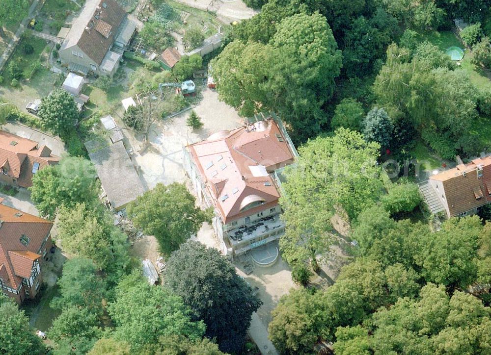 Potsdam - Babelsberg from the bird's eye view: Umbau einer alten Stadtvilla in der Karl-Marx-Straße 62 durch die SMN Continental Plan & Bau GmbH in Potsdam-Babelsberg.