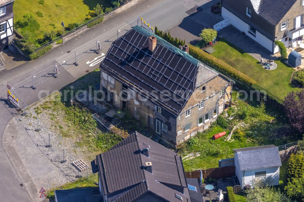 Aerial image Bestwig - Construction for the renovation and expansion of the old building Gasthof Alte Post to a complex with condominiums on place Marktplatz in the district Ostwig in Bestwig at Sauerland in the state North Rhine-Westphalia, Germany