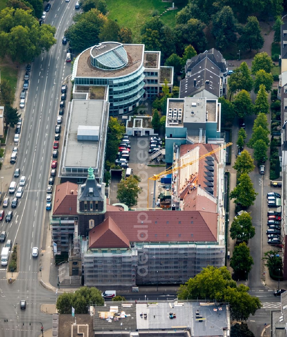 Essen from the bird's eye view: Construction site for reconstruction and modernization and renovation of an office and commercial building of EMSCHERGENOSSENSCHAFT and LIPPEVERBAND on Kronprinzenstrasse in Essen in the state North Rhine-Westphalia, Germany