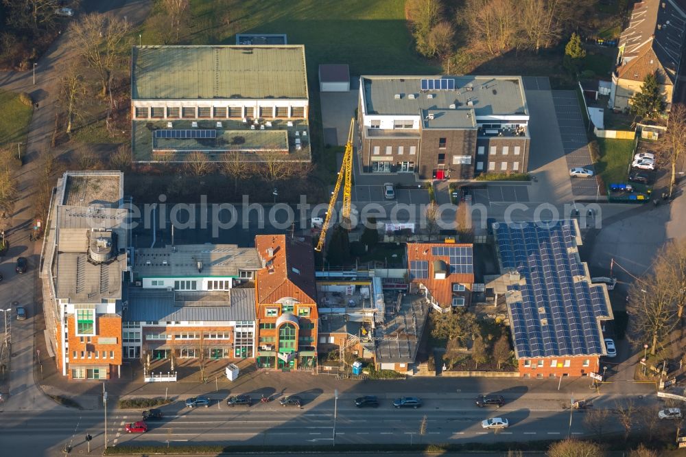 Dorsten from the bird's eye view: Construction site for reconstruction and modernization and renovation of an office and commercial building on Halterner Strasse in Dorsten in the state North Rhine-Westphalia, Germany